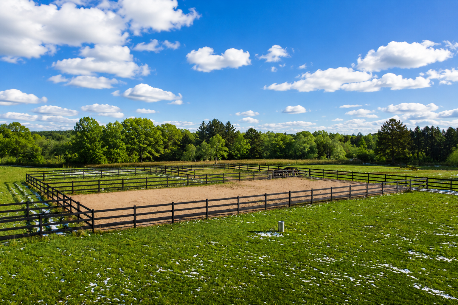 Gloss white Kuptz Steel Fence at Wangard estate with American flag at dusk